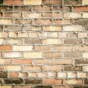 Papier peint effet mur de briques anciennes patinées authentiques